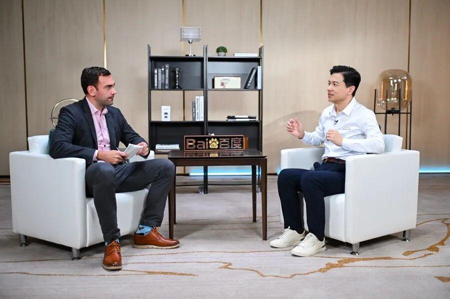 60c8d796j00t77cjg001td000p000gnm 李彦宏:2025 年是 AI 应用普及关键年,机会在应用层